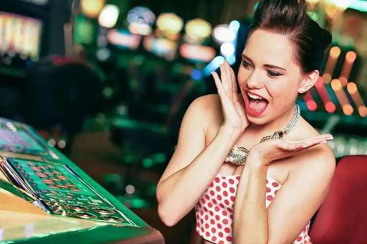 Roulette wheel spinning with betting layout visible